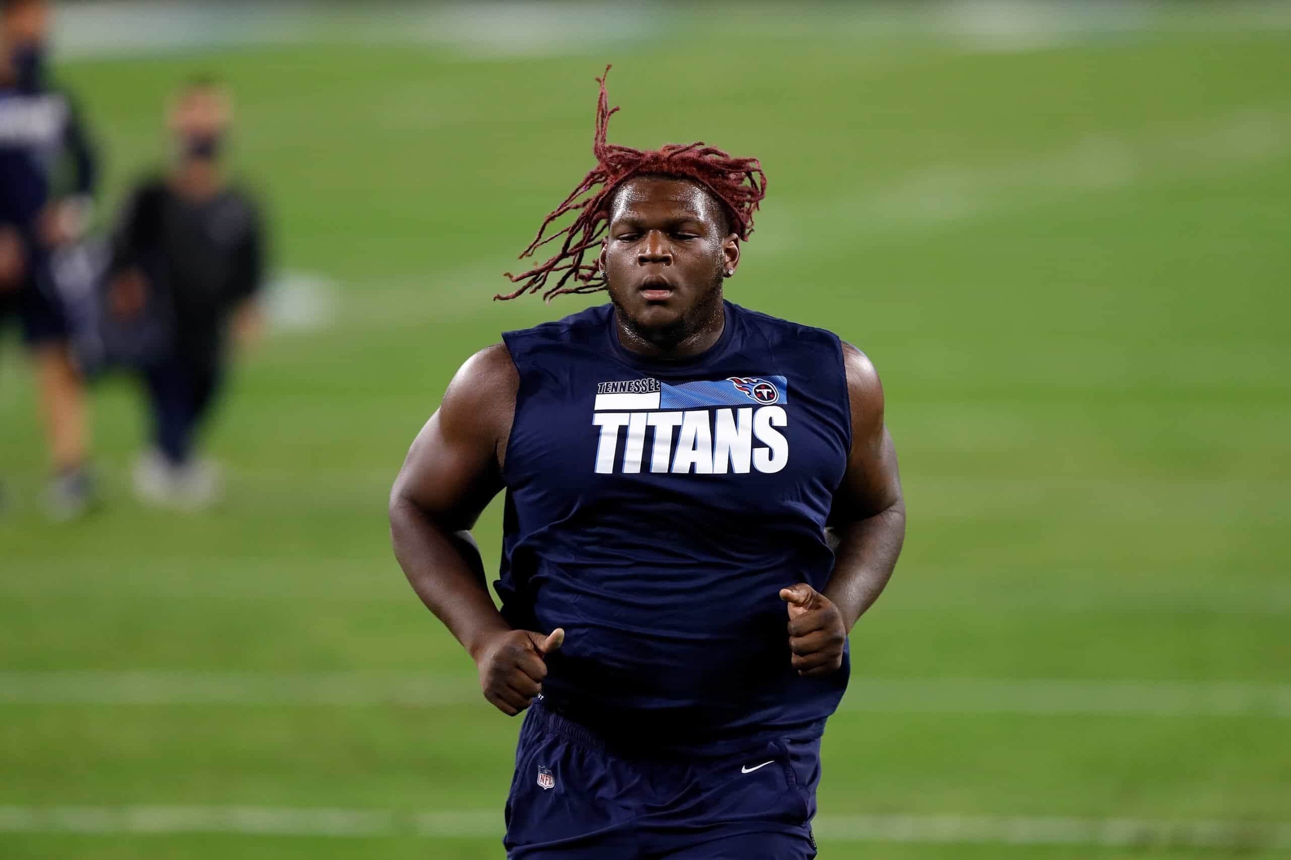Isaiah Wilson #79 of the Tennessee Titans participates in warmups prior to a game against the Indianapolis Colts at Nissan Stadium on November 12, 2020 in Nashville, Tennessee.