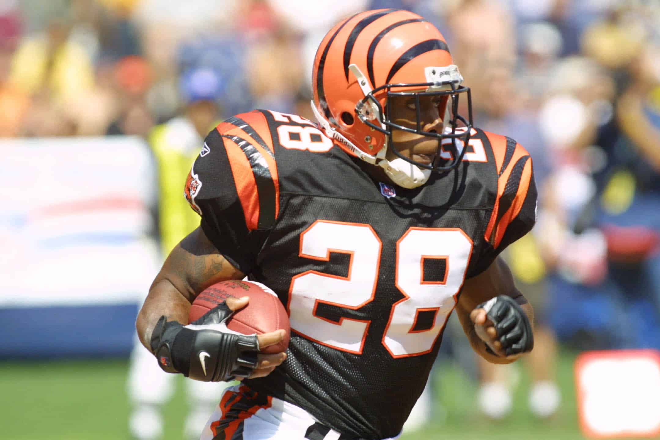 Corey Dillon #28 of the Bengals runs with the ball against the Chargers in their game at Qualcomm Stadium in San Diego, California. The Chargers won 28-14. DIGITAL IMAGE