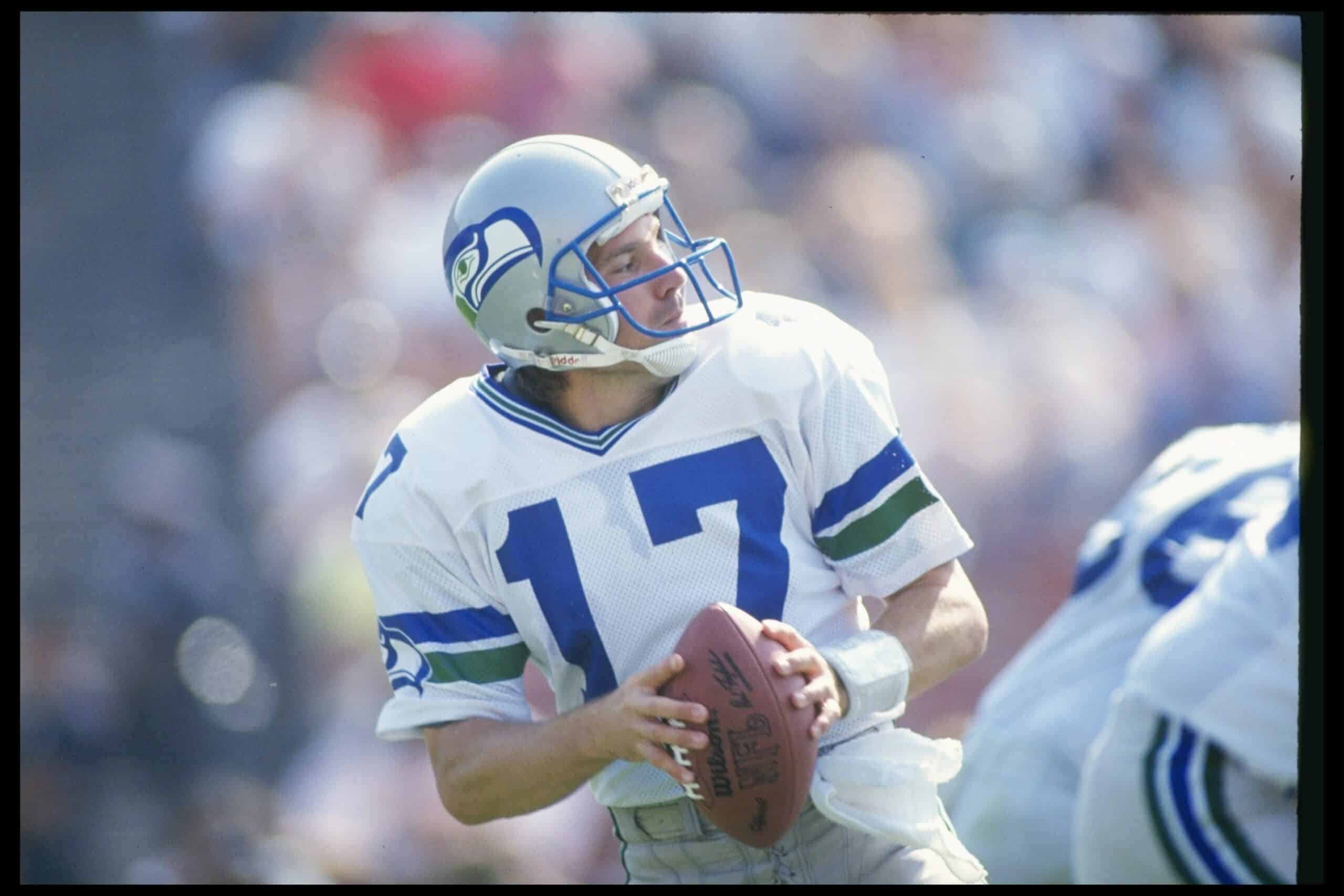 Quarterback Dave Krieg of the Seattle Seahawks looks to pass