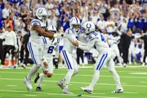 INDIANAPOLIS, INDIANA - SEPTEMBER 14: Luke Rhodes #46 celebrates with Spencer Shrader #3 of the Indianapolis Colts after Shrader kicked the game-winning field goal to beat the Denver Broncos 29-28 at Lucas Oil Stadium on September 14, 2025 in Indianapolis, Indiana.